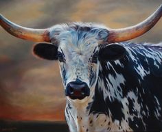 a painting of a cow with large horns