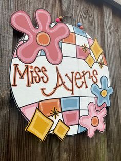 a wooden sign that says miss ayers on it