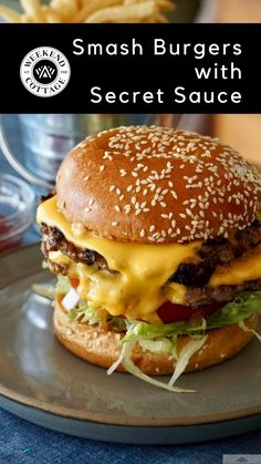 a cheeseburger on a plate with french fries