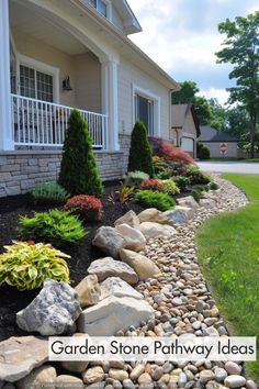 a garden stone pathway leads to a house