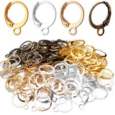 many different types of metal rings on a white background