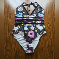 One Piece Swimsuit. Women's Size Xl. Unicorns & Donuts. Brand New Without Tag. Fun Fitted Black Swimwear, Source Unknown, Pink Black, Womens Swim, One Piece Swimsuit, Donuts, Black Pink, Swimming, Womens Sizes