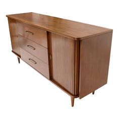 a large wooden dresser with two drawers