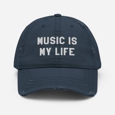 "This \"Music is my life\" funny quote is embroidered on adjustable distressed baseball cap. This 100% unstructured cotton baseball hat is perfect for everyday use. Expand your headwear collection with this fashionable dad hat. With a slightly distressed brim and crown fabric, it'll add just the right amount of edge to your look. For a quick and easy outfit pair it with slacks, your favorite jeans, and a sports tee. * 100% pre-shrunk cotton twill * Soft crown * 6 sewn eyelets * 6 stitched rows o Funny Baseball Hat, Paul Atreides, Distressed Baseball Cap, Baseball Humor, Funny Hats, Artist Gifts, Birthday Gifts For Sister, Sport T-shirts, Embroidered Hats