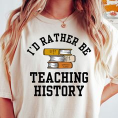 This history shirt makes a totally unique history gift for history teachers and professors, especially during Teacher Appreciation Week and more! Grab this tee today while it's on sale! Delivery Times: ◦ Production: 1 business day on average (maximum: 5) ◦ Shipping: 2 business days on average (maximum: 5) Unisex Fit: ◦ Extra soft, preshrunk unisex t-shirt ◦ Women: Semi-fitted, laidback, rollable, & tuckable ◦ Men: Fitted on upper body & loose around the belly ☞ Size up for a looser fit Soft Materials: ◦ Super soft, preshrunk tee with eco-friendly materials ◦ Black, White, & Navy: 100% soft ring spun cotton ◦ Heather Navy: 65% polyester & 35% cotton ◦ Sport Grey: 90% cotton & 10% polyester Football Wife Shirt, Coaches Wife Shirt, History Teacher Shirt, History Teacher Gifts, Funny History, Funny Beer Shirts, Gifts For History Buffs, Coach Shirts, History Teacher