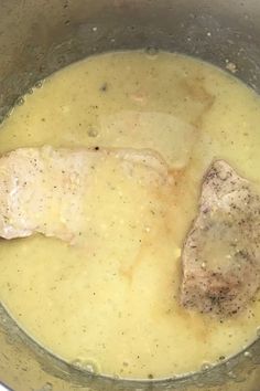 meat and gravy cooking in a pot