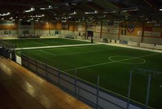 an indoor soccer field is shown in this image