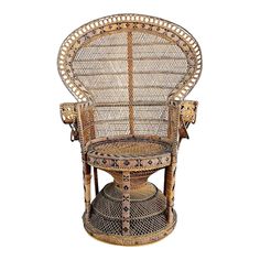 an old wicker chair sitting on top of a table