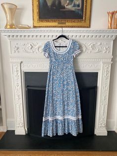 This 1970's Carol + Mary Honolulu dress is in great vintage condition. The zipper works and there are no visible marks. The ruffle details along the sleeves, neck, and hem make this dress so special.  Measurements: Bust- 32" Sleeves- 11.5" Shoulders- 13.5" Empire Waist- 26" Waist- 30" Hips- 34" Length- 50" Blue Floral Maxi Dress, Blue Hawaiian, Honolulu, Floral Maxi, Dress Clothes For Women, Floral Maxi Dress, Empire Waist, Blue Floral, 1970s