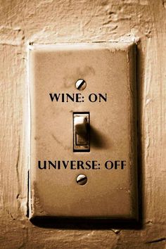 a light switch with the words wine on it and an image of a bottle opener