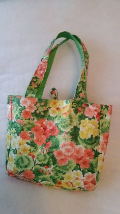 "This carry all fabric bag measures 11.5 x 11.5 x 3.5\" The straps are approximately 21.5\". The bag is fully lined with complementing fabric and they all include a pocket. The bag closes at the top with a string tie. These bags are great for the beach, baby bags, market bags, craft show green bags and a whole lot more. The possibilities are endless! Browse additional bags in my store: https://www.etsy.com/shop/OutIslandEssentials?section_id=16161739&ref=shopsection_leftnav_4 These bags are Baby Tote Bag, Green Bags, Fabric Tote Bag, Diy Bags Purses, Market Bags, Fabric Tote Bags, Diy Bags, Carpet Bag, Fabric Tote