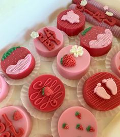 some cupcakes are decorated with fondant and icing