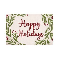 a holiday door mat with the words happy holidays in red and green leaves on it