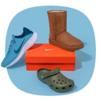 three pairs of shoes are sitting on top of an orange box and one is blue