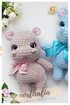 two crocheted teddy bears sitting next to each other