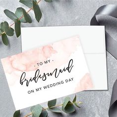 a card that says to my bridesmaid on my wedding day with eucalyptus leaves