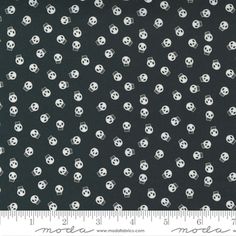 a black and white background with skulls on it