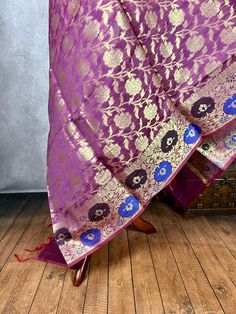 Beautiful Light Purple Color Dupatta with Floral Jaal design and Meenakari Work in Gold with Red Tassels on the ends. Perfect Gift !! Very Light Weight Item: DupattaBase color : Royal Blue Fabric : Semi Silk (Not Pure Silk)Work : Zari Weaved with tasselsLength of the Dupatta : 96 inches approx.Width of the dupatta : 38 inches (Approx.)Store Policies- No return or exchange will be accepted for color variations.- No return or exchange will be accepted if the color does not match your other clothin Dupatta For Lehenga, Jaal Design, Indian Dupatta, Royal Blue Fabric, Scarf Gift, Beautiful Lights, Blue Fabric, Light Purple, Pure Silk