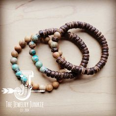 This set of three stretch bracelets combines Imperial Jasper beads and wood beads for a stunning combination of earthy tones and textures. Stylish and versatile, this trio of bracelets is the perfect accessory for modern boho looks and western-inspired ensembles. 8-10mm beaded stretch bracelet Made of Wood and Genuine Imperial Jasper Beads Stretch bracelet fits a variet of wrist sizes Although your item will resemble the photo, each piece is created by hand, so no two are identical.Thank you for Earthy Bracelets, Bracelet Trio, Boho Looks, Earthy Jewelry, Imperial Jasper, Bead Bracelets, Jasper Beads, Boho Look, Beaded Stretch Bracelet