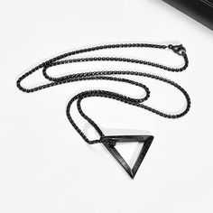 THE MEANING OF VIKING NECKLACE * Mobius Twisted Triangle Necklace Design with Nordic 24 Alphabet Runes Symbol,Norse 24 Viking runes is a magical symbol helps the user find their way when they are lost. Whether this means lost in a storm or lost in a difficult life experience, this ring necklace will help guide you home. * PERFECT VIKING GIFTS * Designed for personal wearing or Great Love/protection/amulet gifts to give your lover, friend, your brother, your father, your son, your boyfriend or yourself etc on Anniversary, Birthday or Any Special Occasions. It is a talisman necklace protects the owner from evil, bad words, envy, gossip and slander, even unspoken or secret and hidden evil. MEASUREMENTS :Pendant Size:1"X1.1", Come with a free cable chain 24 Inches(60cm), High polish smooth sur Black Viking Metal Jewelry, Viking Gifts, Rune Symbols, Vikings Gifts, Talisman Necklace, Viking Necklace, Protection Amulet, Viking Runes, Life Experience