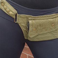 "Utility festival dance rave belt. Lace detail design. Use as travel & shopping money belt. Adjustable to 48 inches. Compact model with 2 pockets.  Waist-hip-bum bag. Burning Man belt.  2 cargo.  Smart  looking solid brass metal harware. Be hands free on the go! Available in 3 best selling colors: black, army green and grey taupe. Exactly as shown in photos. What you see is what you get. In stock and ready to ship in 1-3 business days from receipt of your order. Free shipping in Canada and USA. Bohemian Belt Bag With Belt Loops For Festivals, Hip Belts, Man Belt, Festival Dance, Festival Belt, Vintage Festival, Money Belt, Detail Design, Shoulder Sling