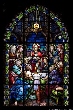 a stained glass window depicting the birth of jesus