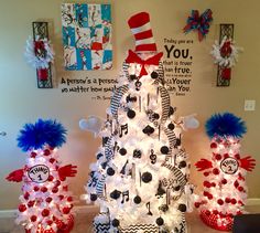 the cat in the hat christmas tree is decorated with red, white and blue decorations