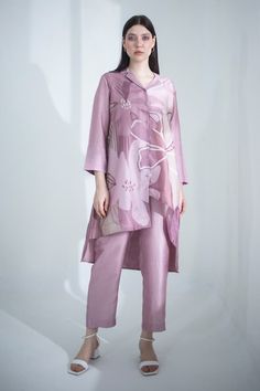 Dusky pink high low kurta with abstract geometric and floral print. Paired with coordinating straight pant. - Aza Fashions Elegant Pink Printed Set, Pink Printed Silk Sets, Spring Pink Sets With Relaxed Fit, Relaxed Fit Pink Sets For Spring, Pink Relaxed Fit Sets For Spring, Chic Pink Printed Sets, Pink Silk Sets For Spring, Spring Printed Pink Sets, Feminine Silk Sets For Spring