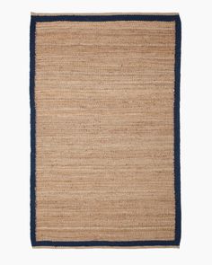 an area rug with blue trim on the edges and a black border at the bottom