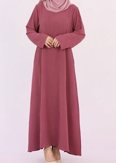 Dark Pink Kira loose slip dress with pockets in maxi length and with long sleeve - ANNAH HARIRI Casual Long Sleeve Abaya With Modesty Panel, Modest Long Sleeve Abaya With Modesty Panel, Long Sleeve Modest Abaya With Modesty Panel, Long Sleeve Abaya With Modesty Panel For Fall, Fall Long Sleeve Abaya With Modesty Panel, Modest Maxi Length Abaya For Fall, Fall Modest Maxi Length Abaya, Fall Season Modest Maxi Length Abaya, Casual Solid Color Abaya For Spring