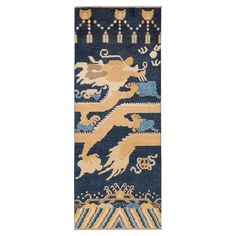 a blue and yellow rug with lions on it