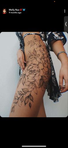 a woman's thigh with flowers on it and the words mommy i am sorry on it