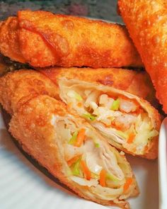 some fried food on a plate with dipping sauce