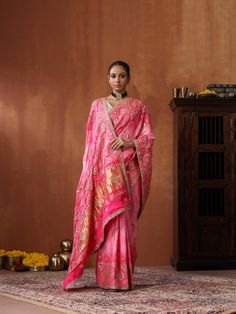 This Bandhani saree with Gotta Patti embroidery is a timeless masterpiece, blending traditional artistry with contemporary elegance. Crafted from pure Gajji silk in a striking red hue, it exudes grace and sophistication. Silk Sharara With Zari Work For Puja, Slub Silk Traditional Wear With Zari Work For Ceremonies, Tussar Silk Sharara With Cutdana For Puja, Slub Silk Traditional Wear With Resham Embroidery For Puja, Slub Silk Pre-draped Saree With Zari Work For Puja, Traditional Slub Silk Wear For Puja With Resham Embroidery, Traditional Wear Dupatta In Slub Silk For Ceremonies, Art Silk Pre-draped Saree For Traditional Ceremonies, Dola Silk Pre-draped Saree For Traditional Ceremonies