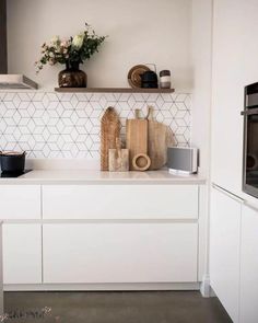 the kitchen counter is clean and ready for us to use in this home decor project