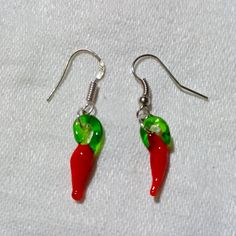 These Are Handmade, Lovely, And Adorable, Little Chili Pepper Earrings! They Are So Dainty. They Are Hand-Blown Lampwork Glass So Each One Is Different. The Red And Green Chili Peppers Measure Approximately 1/2" In Length So The Earrings In Total Are About 1 1/8". I Hope You Like These As Much As I Do. I Make Sell Jewelry Here, And There Is A Necklace That Matches This In My Closet! Thanks For Stopping By, And Feel Free To Leave Me A Fair Offer. :) Handmade Red Casual Earrings, Handmade Casual Red Earrings, Pepper Earrings, Green Chili Peppers, Sell Jewelry, Gold Diamond Hoop Earrings, Green Chili, Turquoise Earrings Dangle, Heart Dangle Earrings