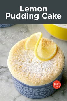 a lemon pudding cake on a table with the title overlay that reads, lemon pudding cake