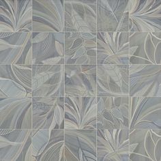 an artistic tile design in shades of grey and white