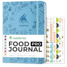 the clever fox food journal is open to reveal several different pages, including one in blue and