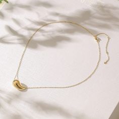 Durable and stylish, our waterproof necklace crafted for both functionality and fashion. Perfect for any occasion, it's the ideal accessory for those who appreciate durability and timeless elegance. Perfect for the minimalist and a beautiful piece to layer with. A true versatile statement piece that you can wear straight from the pool to dinner! - 18K gold plated / stainless steel - Waterproof technology - Hypoallergenic Minimalist Drop Necklace With Adjustable Length, Trendy Adjustable Cable Chain Necklace, Minimalist Adjustable Clavicle Chain Drop Necklace, Minimalist Long Charm Necklace, Minimalist Long Drop Necklace With Clavicle Chain, Minimalist Drop Necklace With Adjustable Length As Gift, Modern Everyday Necklace With Adjustable Length, Trendy Everyday Drop Jewelry, Modern Adjustable Length Necklace For Everyday