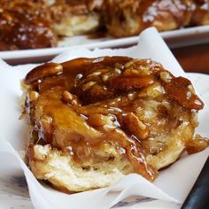 there is a piece of bread with caramel on it and a fork next to it