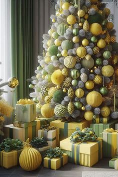 a christmas tree is decorated with yellow and green balls, wrapped in gold ribbon and surrounded by presents