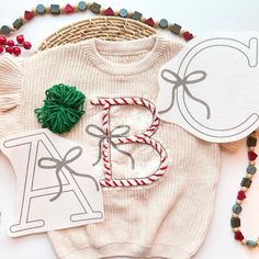 PDF Embroidered Bow Sweater, Digital Letter Stick and Stitch Embroidery Alphabet Pattern, Initial Embroidered Knit Sweater PDF Templates - Etsy Cross Stitch Sweater, Embroidered Gifts Ideas, Sweater Embroidery Ideas, Embroidered Christmas Sweater, Cricut Projects To Sell, Embroidered Sweaters, Stick And Stitch, Embroidered Bow