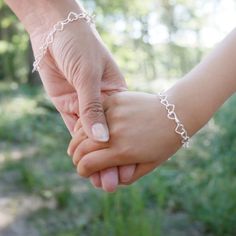 "See more Bracelets! https://www.etsy.com/uk/shop/LilyCharmed?ref=seller-platform-mcnav&section_id=17722071 This sterling silver heart bracelet, is an adorable way of showing someone how much you love them. Forever linked, forever loved. The perfect gift, from a mother to a daughter, bride to bridesmaids, sister to sister, husband to wife. The linked hearts, symbolising never ending love, friendship and devotion. Want to personalise your bracelet for no extra charge? We can print your messag Adjustable Heart Bracelet With Jubilee For Valentine's Day, Adjustable Heart Jubilee Bracelet For Valentine's Day, Adjustable Jubilee Heart Bracelet For Valentine's Day, Mother's Day Heart-shaped Hypoallergenic Name Bracelet, Hypoallergenic Heart-shaped Name Bracelet For Mother's Day, Mother's Day Heart Charm Bracelet, Hypoallergenic Heart Bracelet For Birthday And Mother's Day, Heart Bracelet For Mother's Day Friendship, Mother's Day Double Heart Friendship Bracelet