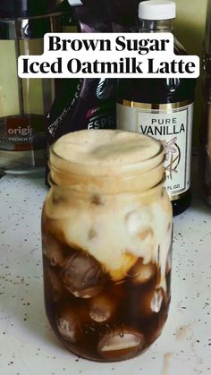 brown sugar iced oatmeal latte in a mason jar on a counter