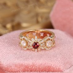 Antique Red Spinel Moonstone Three Stone Engagement Ring, Edwardian Ruby Promise Ring, Victorian Ruby Diamond Ring, Mothers Ring 3 Stones ✧･ﾟ: *✧･ﾟ:* Welcome to Charles Davin Jewelry*:･ﾟ･ﾟ✧ Moissanite - a gemstone known to bring in luck in someone's life, the user can give off a look of elegance. You can give your special someone luck whilst showing your love to them. ✶Material: 10K/ 14K/ 18K ✶Main Stone: Natural Red Spinel; Approx. 3.5mm ✶Side Stone: - Natural Moonstone; 3.0mm-2 - Moissanite; T Red Cluster Ring With Rose Cut Diamonds, Fine Jewelry Three Stone Round Ruby Ring, Rose Gold Three Stone Round Jewelry, Unique Ruby Ring With Diamond, Three Stone Round Moonstone Ring Gift, Three Stone Moonstone Ring Gift, Exquisite Three-stone Round Ring, Round Multi-stone Ruby Ring With Garnet, Exquisite Three Stone Round Ring