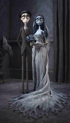 the corpse bride and groom are standing next to each other