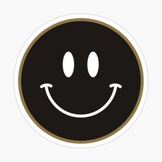 a black and gold smiley face sticker