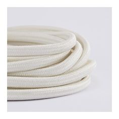 a white round cord on a white background