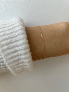 This barely there bracelet is perfect for the minimalist!  D E T A I L S  *Made with  a high quality14k gold filled chain. This is super skinny chain measuring 1.1mm- this is the daintiest chain on my shop. *It is diamond cut making it extremely sparkly. *Length: Choose the length you prefer from the drop down menu. Chain bracelets work best with a snug fit. C A R E * T I P This is a delicate bracelet so please follow the care instructions. To keep your bracelet is great condition avoid contact Simple Gold Bracelet, Gold Bracelet Simple, Permanent Jewelry, Aesthetic Stuff, Classy Jewelry, Business Class, Minimalist Bracelet, Dainty Bracelets, Gold Bracelet Chain